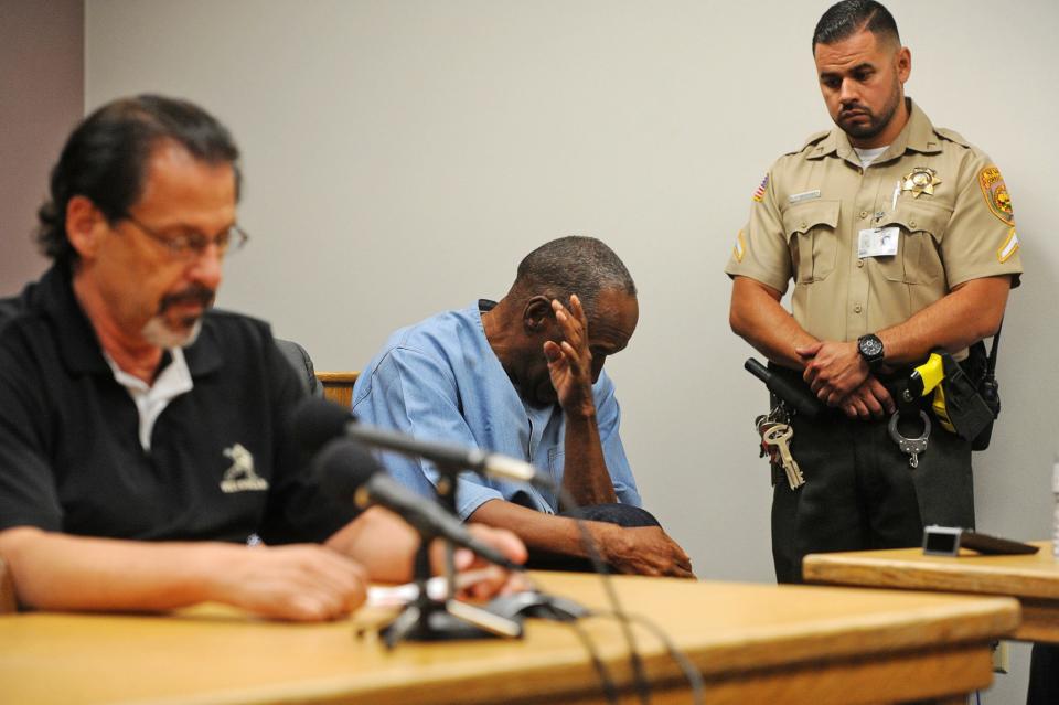 <p>O.J. Simpson (center) reacts during his parole hearing at Lovelock Correctional Centre in Lovelock, Nevada, U.S. July 20, 2017. REUTERS/Jason Bean/POOL </p>