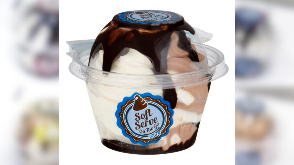  single serving plastic cup of vanilla and chocolate swirled ice cream with fudge on top 