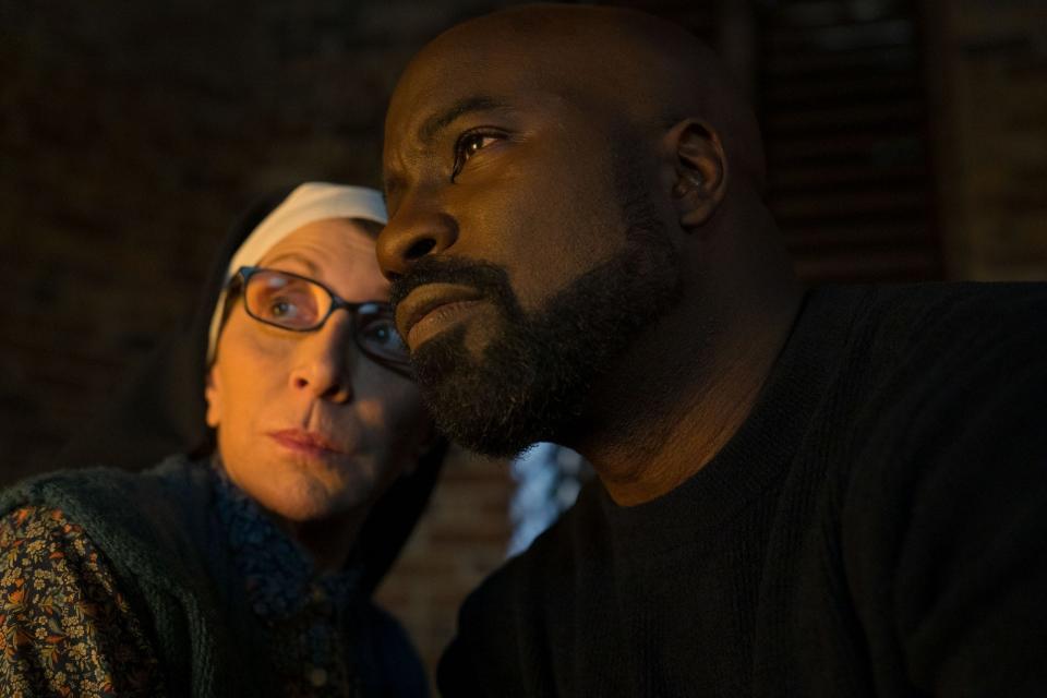 Sister Andrea (Andrea Martin) and priest David (Mike Colter) are there for each on a spiritual level in "Evil."