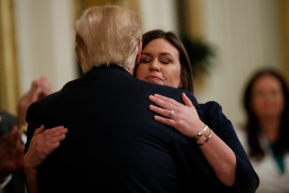 Press secretary Sarah Sanders with President Donald Trump on June 13 in Washington, D.C., following her  announcement that she will leave her position at the White House.