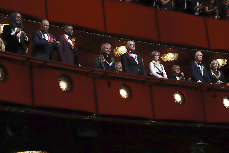 2019 Kennedy Center honorees, from left, Earth, Wind & Fire members Verdine White, Ralph Johnson and Philip Bailey; singer Linda Ronstadt, conductor Michael Tilson Thomas, actress Sally Field and Sesame Street co-founders Lloyd Morrisett and Joan Ganz Cooney attend the 42nd Annual Kennedy Center Honors at The Kennedy Center on Sunday, Dec. 8, 2019, in Washington. (Photo by Greg Allen/Invision/AP)