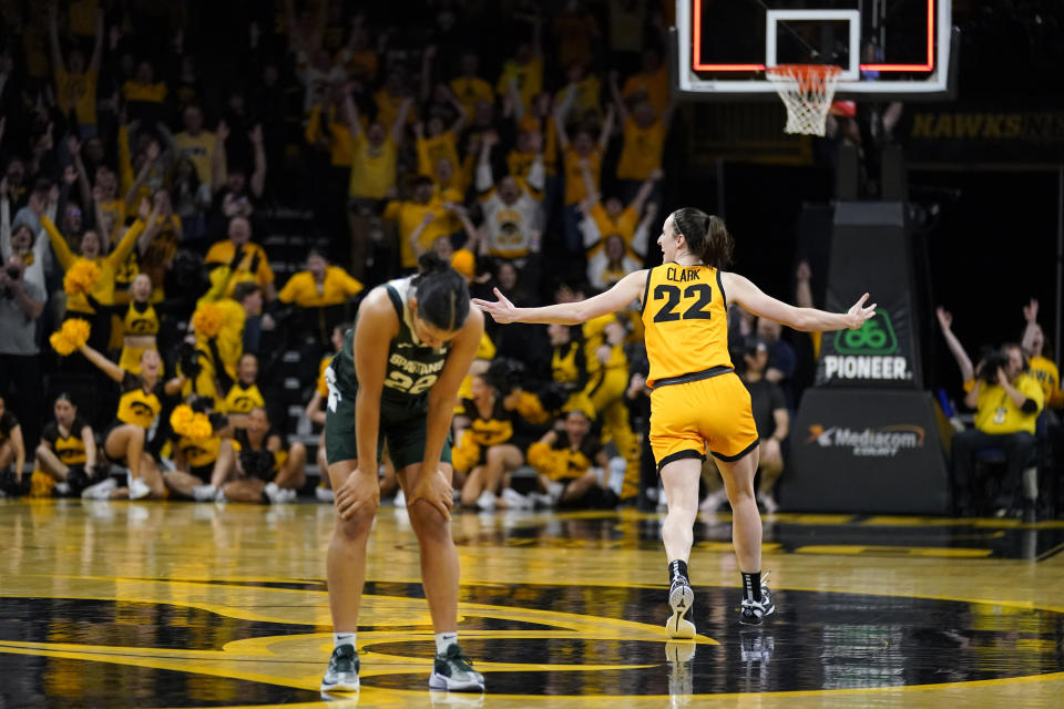 Iowa's Caitlin Clark celebrates her buzzer-beating 3-pointer that secured victory over Michigan State. (AP Photo/Charlie Neibergall)