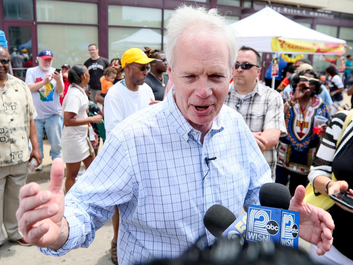 A large crowd begins to form and starts to boo Sen. Ron Johnson, R-Wis., as he makes a speech during the Juneteenth Day Celebration Saturday, June 19, 2021, in Milwaukee.  (AP)