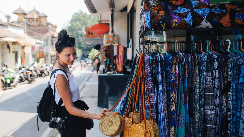 young traveler shopping in Ubud, Bali, Indonesia