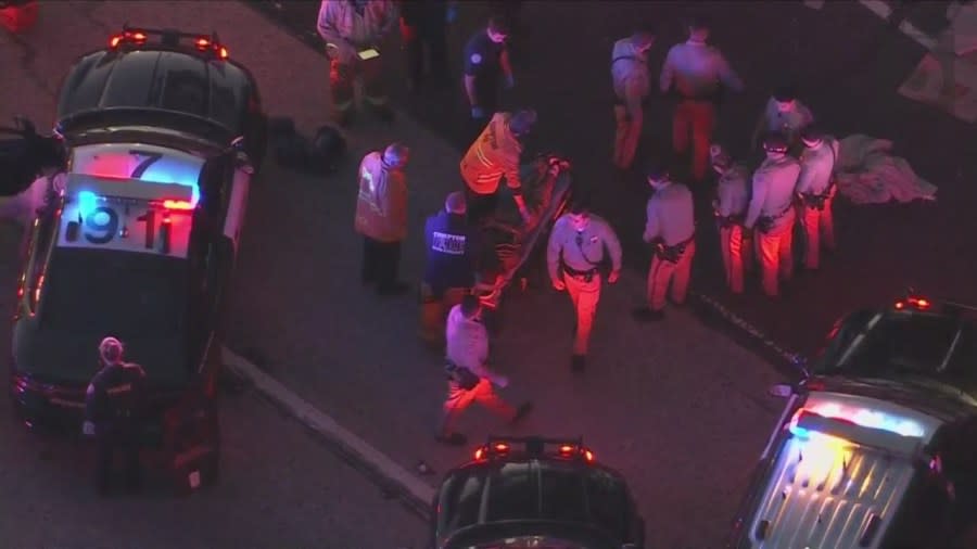 The suspect was placed onto a gurney and transported to the hospital for medical evaluation. (KTLA)