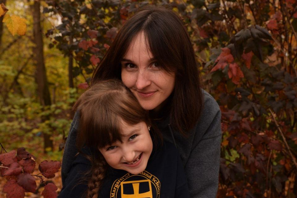 Viktoriia Sydorska, 33, and her daughter, Varvara, 7, evacuated to Lviv, Ukraine, after their hometown of Kherson was overrun by Russian troops. Varvara has been attending school online but misses her friends and her school work is disrupted by frequent air raid sirens.