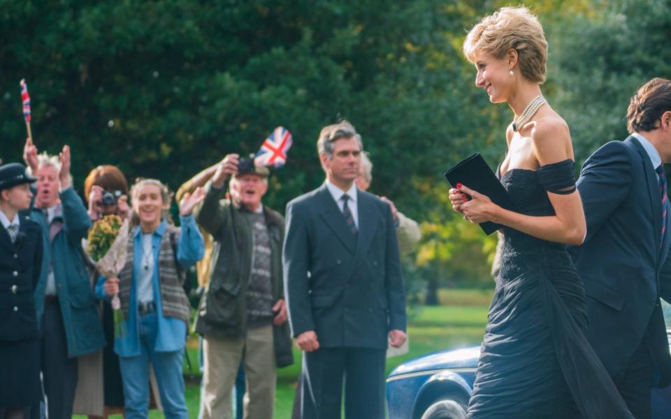 The black, off-the-shoulder cocktail dress inspired by Princess Diana’s famous 'revenge dress' and worn by Elizabeth Debicki will be on display