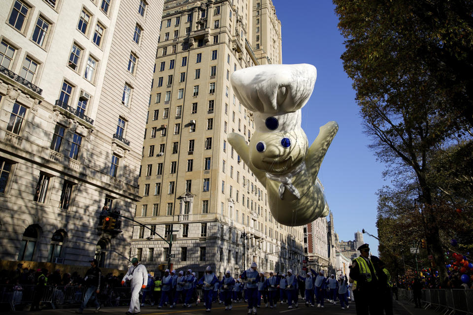 The Pillsbury Doughboy balloon make its way down Central Park West during the Macy's Thanksgiving Day Parade, Thursday, Nov. 24, 2022, in New York. (AP Photo/Julia Nikhinson)