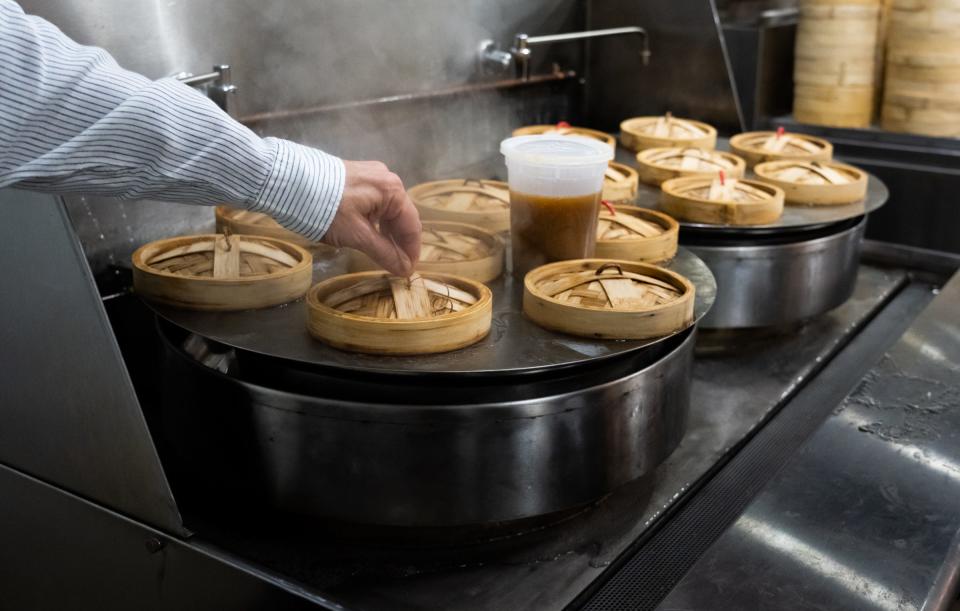 Steam rises from a dim sum station at RedFarm in Austin, the third location of the popular New York City-based Chinese restaurant.