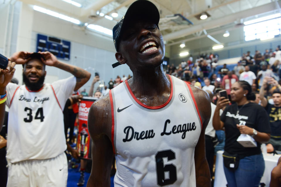 Back-to-back Drew League MVP Franklin Session (right) celebrates after winning the championship. (Photo courtesy of Aaron Poole/Drew League)