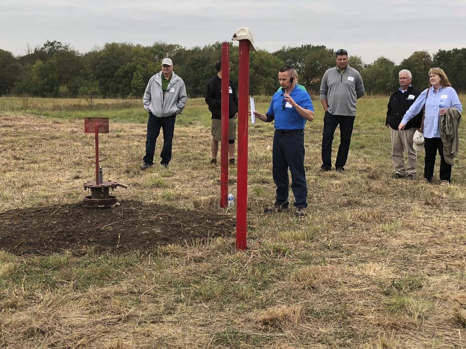 NioCorp Chief Operating Officer Scott Honan tells a group of investors about the plans for a proposed mine in southeast Nebraska, on Oct. 6, 2021 in Elk Creek, Neb. The company hopes to build a mine in to extract critical minerals if it can raise $1 billion. (AP Photo/Josh Funk)