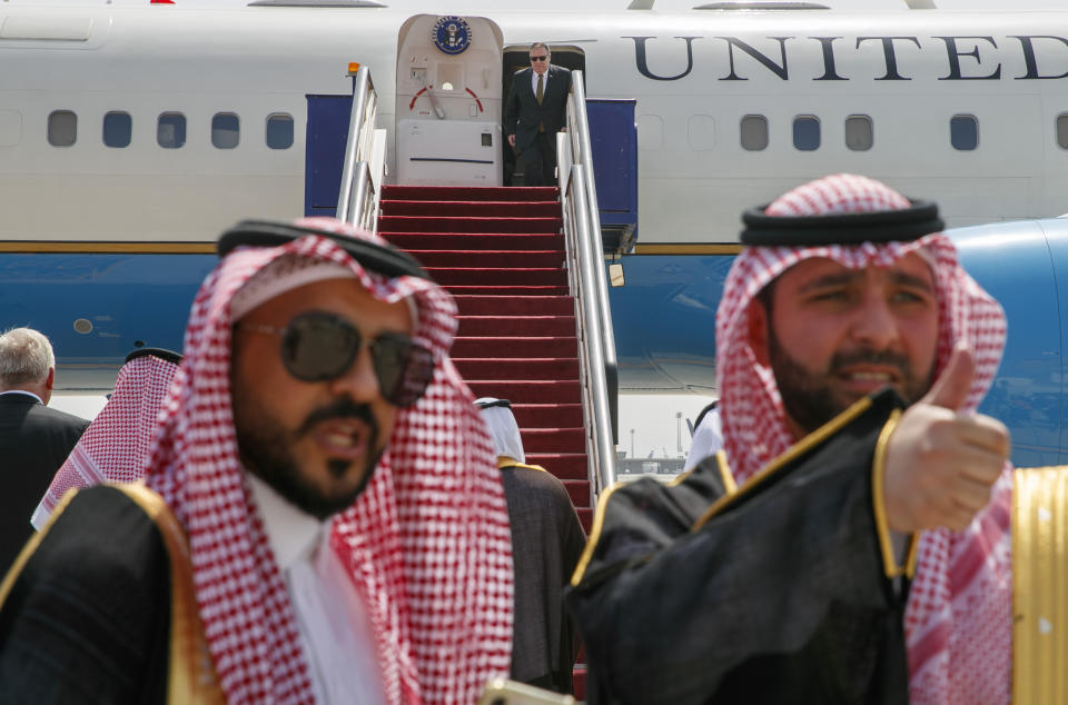 U.S. Secretary of State Mike Pompeo, top, exits a plane on arrival to Jeddah, Saudi Arabia, Monday, June 24, 2019. Pompeo is conducting consultations during a short tour of the Middle East, including visits to Saudi Arabia and United Arab Emirates.(AP Photo/Jacquelyn Martin, Pool)