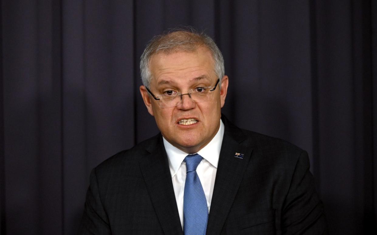 Australian Prime Minister Scott Morrison speaks to the media regarding coronavirus at Parliament House in Canberra - LUKAS COCH/EPA-EFE/Shutterstock