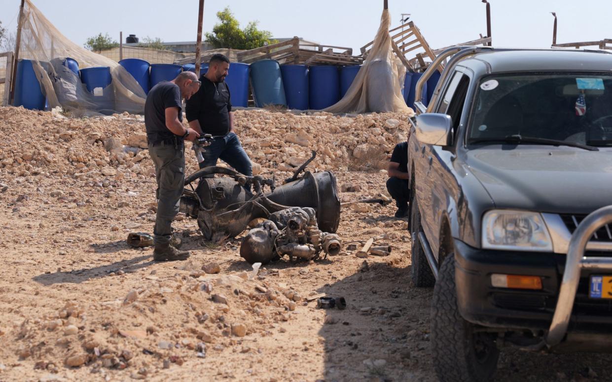 The remains of a rocket booster that, according to Israeli authorities critically injured a 7-year-old girl