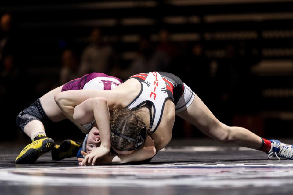 Unitah’s Sadie Rhoades and Jordan’s Abbey West compete in the 4A Girls Wrestling State Championships at the UCCU Center in Orem on Thursday, Feb. 15, 2024. | Marielle Scott, Deseret News
