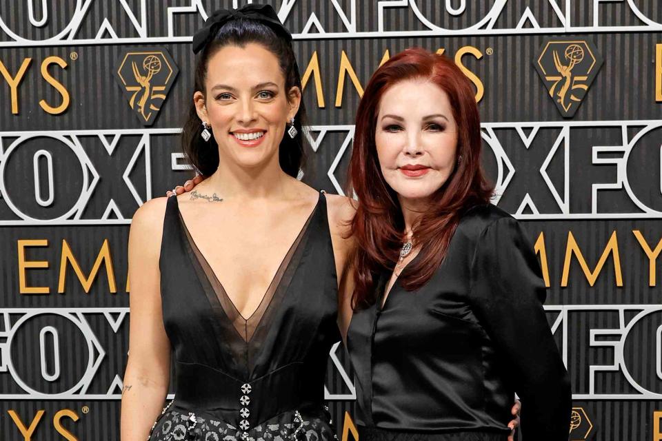 <p>Frazer Harrison/Getty </p> Riley Keough (left) and Priscilla Presley at the 2023 Emmys in Los Angeles on Jan. 15, 2024