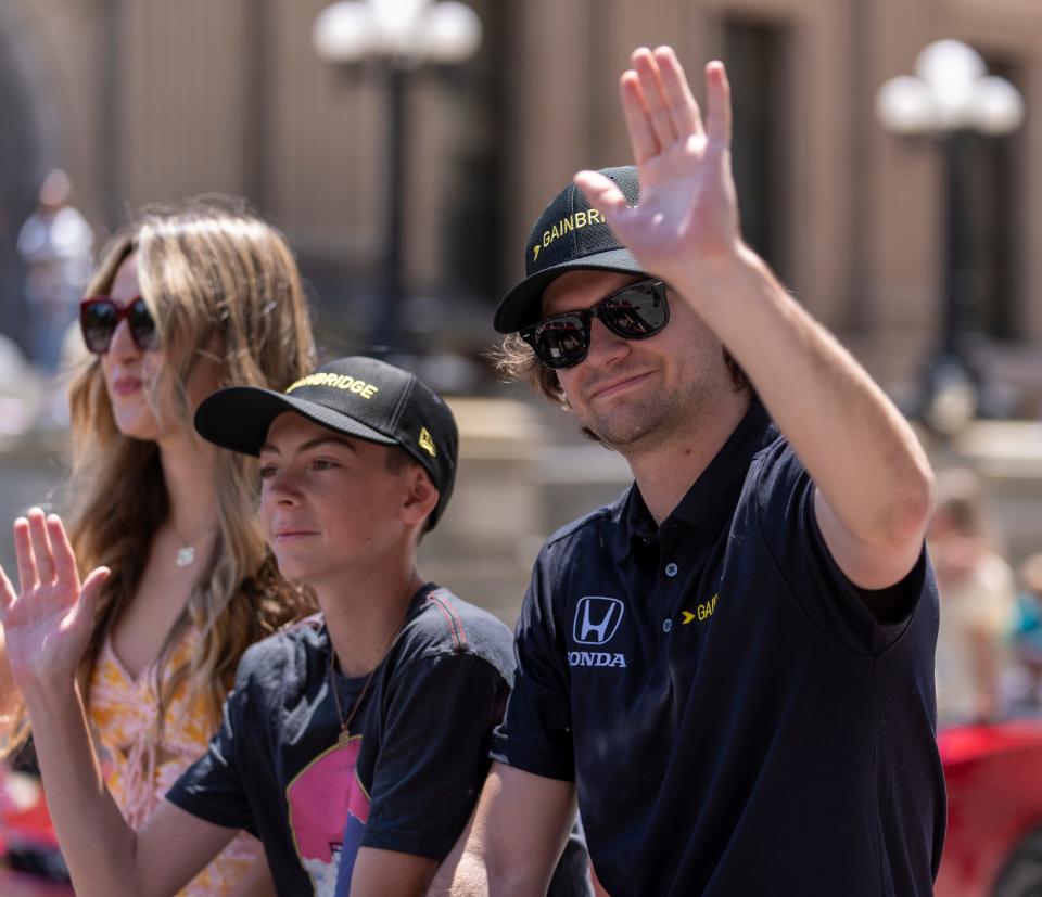Colton Herta, who is in row nine, Indianapolis, Saturday, May 28, 2022, during the 500 Festival Parade.