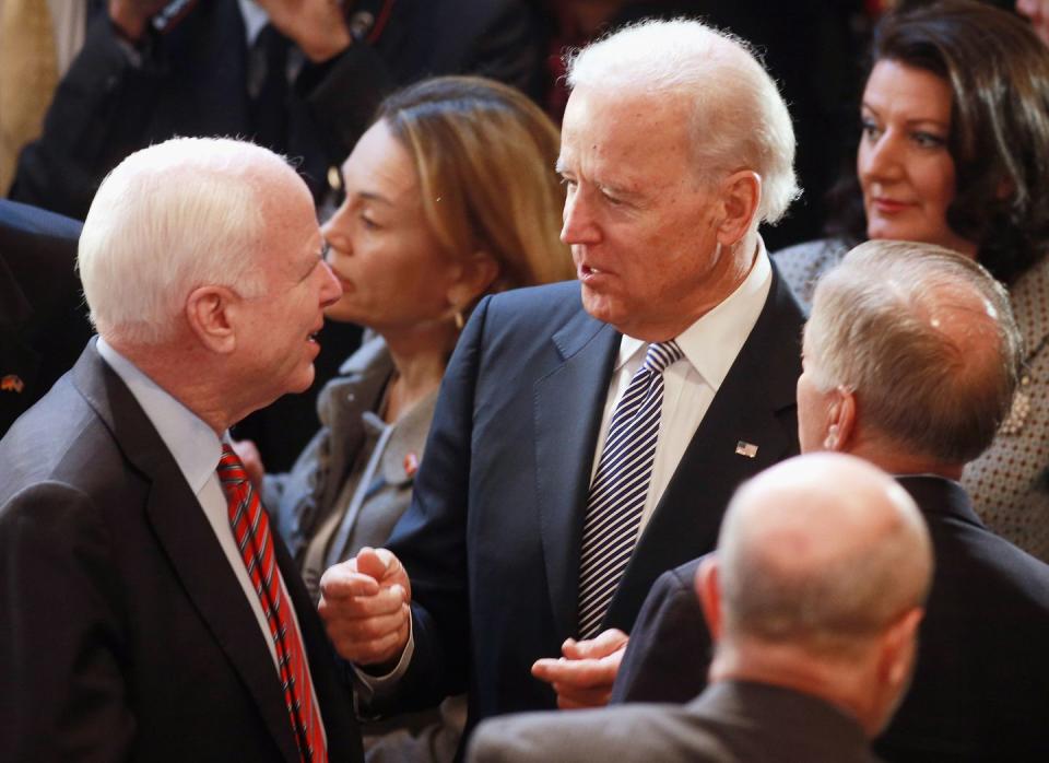 <p>Vice President Joe Biden chats with McCain at the 49th Munich Security Conference on February 2, 2013.</p>