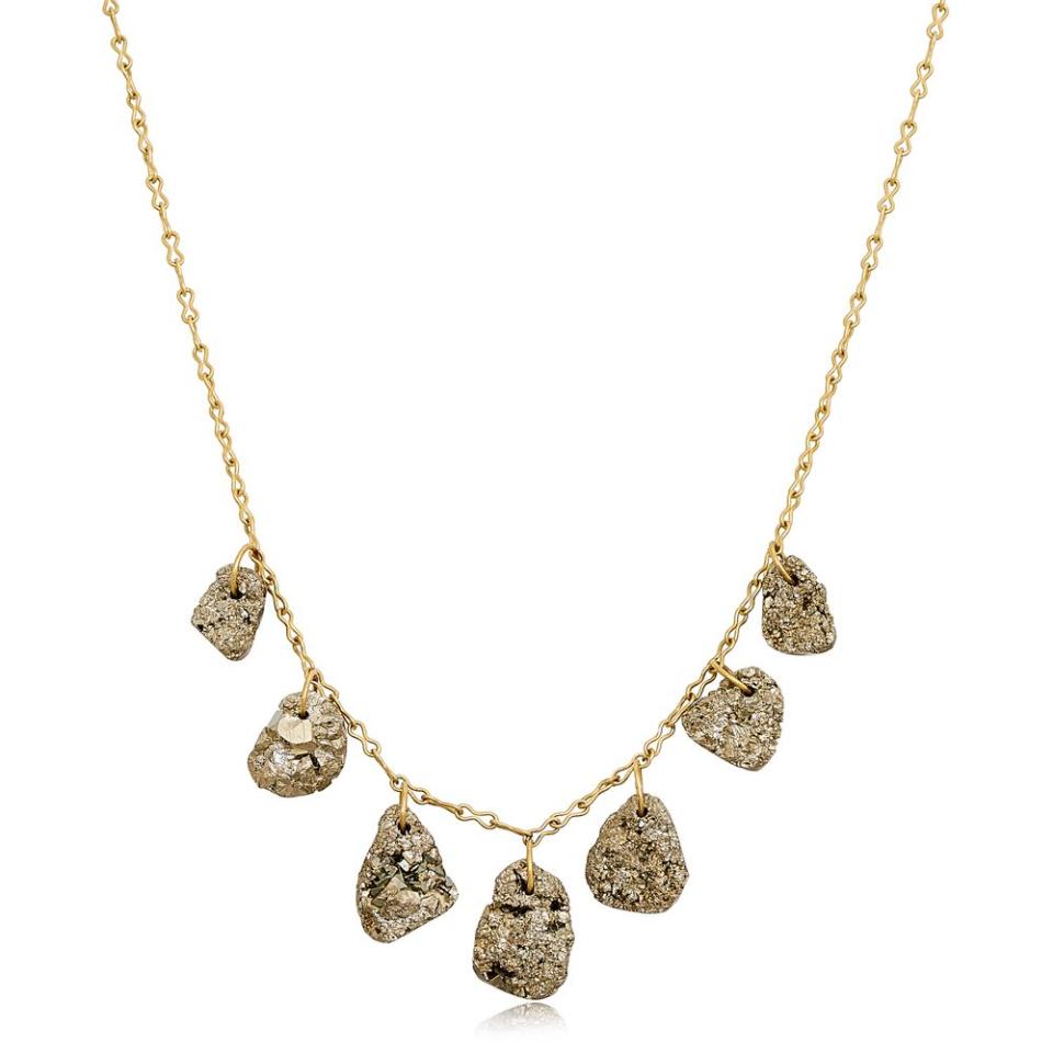 <p>We love the ancient look of these pyrite pendants (traditionally associated with good luck), juxtaposed with the smooth, modern chain of this necklace. </p><p>Gold and pyrite necklace, £2,000, Pippa Small </p><p><a class="link " href="https://pippasmall.com/product/18kt-gold-pyrite-dazzle-seven-stone-drill-loop-necklace/" rel="nofollow noopener" target="_blank" data-ylk="slk:SHOP NOW;elm:context_link;itc:0;sec:content-canvas">SHOP NOW</a></p>