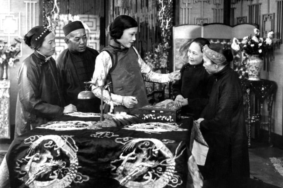 Anna May Wong (center) in The Toll of the Sea, her first leading role | Everett