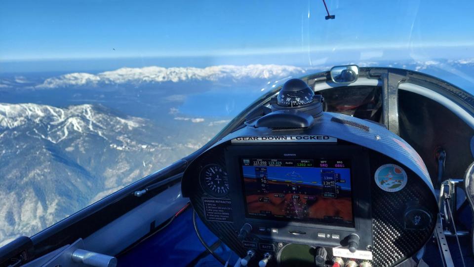Sarasota-based test pilot and engineer Miguel Iturmendi captured two world records in June 2, 2023 when he piloted the Helios Horizon above the Sierra Nevada Mountain range near Lake Tahoe, Nevada. This camera shows a view of the mountain range and lake from the pilot seat. For the record-setting flight, Iturmendi flew the electric plane with two batteries to a height of 16,023 feet, then set a second record by maintaining a level, precision flight for three minutes.