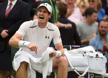 Britain Tennis - Wimbledon - All England Lawn Tennis & Croquet Club, Wimbledon, England - 2/7/16 Great Britain's Andy Murray reacts during his match against Australia's John Millman REUTERS/Toby Melville