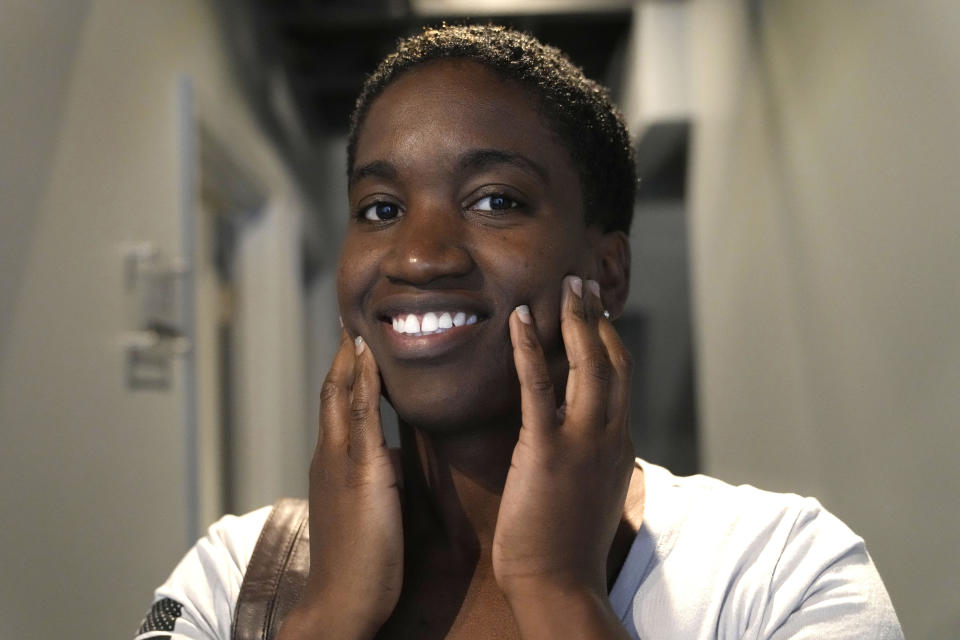 U.S. Air Force veteran Priscila Jimenez, 37, talks about her experiences after a workout session at the Grey Team veterans center, Wednesday, May 17, 2023, in Boca Raton, Fla. The center is helping veterans with post-traumatic stress disorder and other mental and physical ailments get back into the civilian world. (AP Photo/Lynne Sladky)