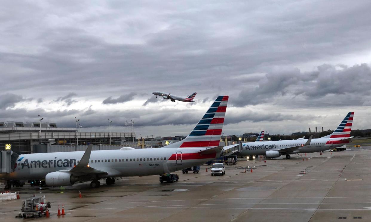 <span>The American Airlines plane had been traveling up to 100mph when it was ordered to break immediately.</span><span>Photograph: Daniel Slim/AFP/Getty Images</span>