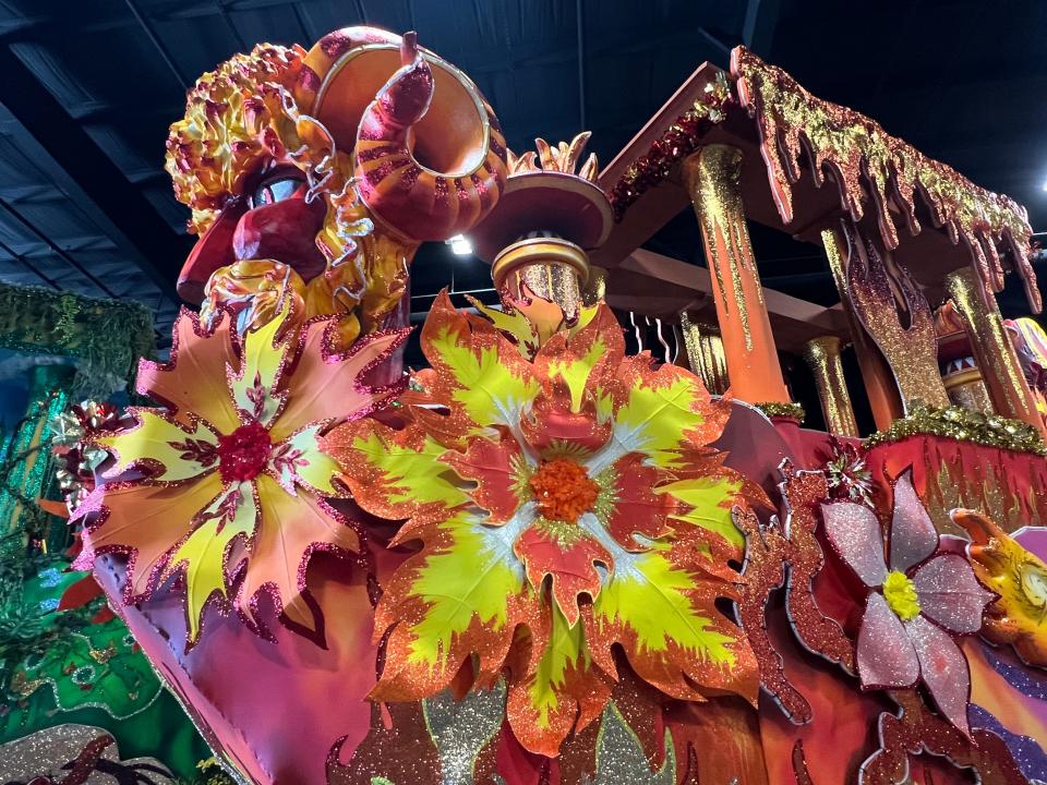 Lora Sauls said they can always tell when a Kern Studios prop has been used in a previous Universal Orlando parade because of all the glitter. The resort's decor also creates these giant flowers, which adorn many of their Mardi Gras floats.