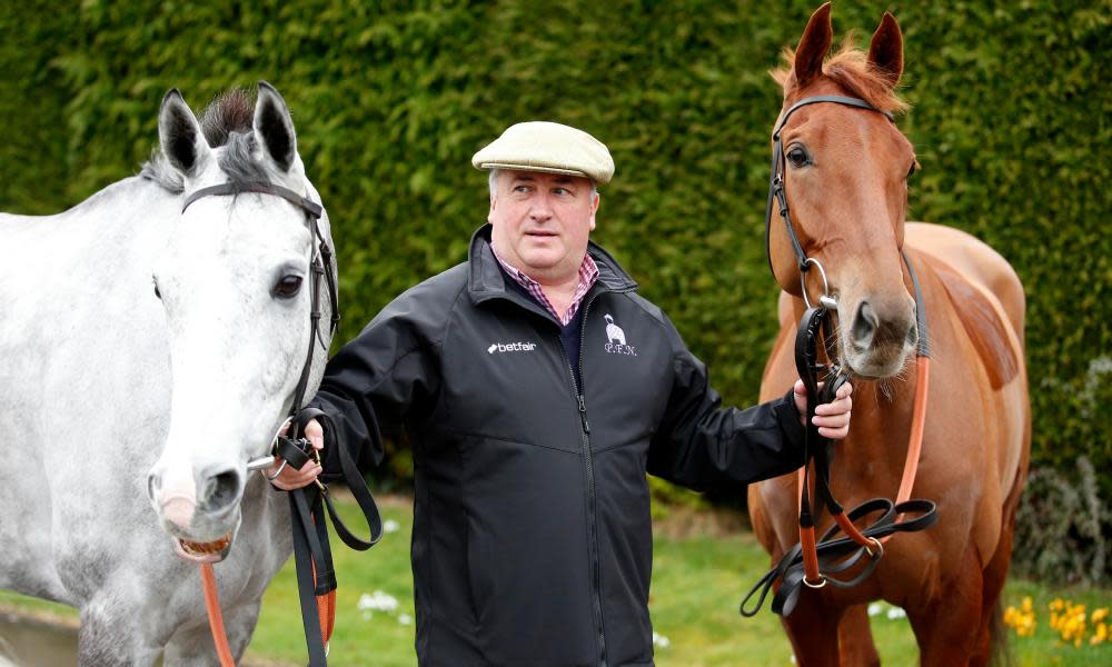 Paul Nicholls with Politologue, left, and Movewiththetimes at his Somerset stable on Tuesday.