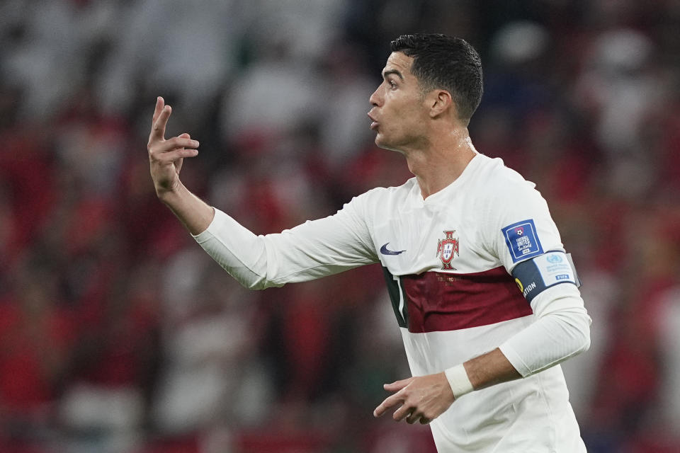 Portugal's Cristiano Ronaldo gestures after entering the pitch during the World Cup quarterfinal soccer match between Morocco and Portugal, at Al Thumama Stadium in Doha, Qatar, Saturday, Dec. 10, 2022. (AP Photo/Martin Meissner)