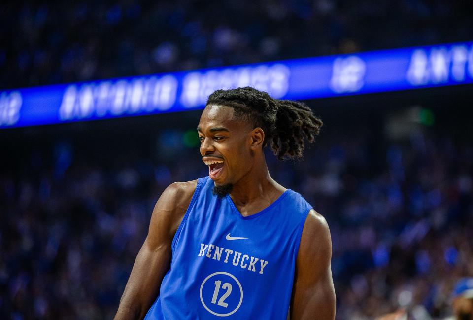 Kentucky's Antonio Reeves (12) celebrated winning the three-point contest at Big Blue Madness on Friday evening at Rupp Arena. Oct. 13, 2023