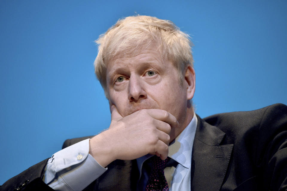 Conservative party leadership candidate Boris Johnson gestures, during the first party hustings at the ICC in Birmingham, England, Saturday June 22, 2019. The two finalists in the race to lead Britain’s governing Conservative Party and become the country’s new prime minister made their first formal pitches to party members Saturday. (Ben Birchall/PA via AP)