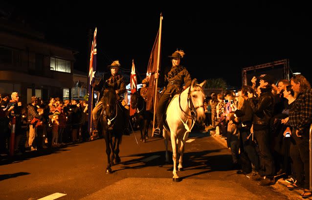 The Anzac Day dawn service held by the Currumbin RSL is seen at Elephant Rock on Currumbin Beach. Source: AAP