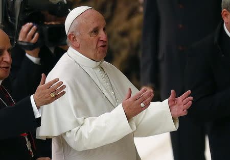 Pope Francis gestures during a special audience for the Jubilee of the workers of the shrines in Paul VI hall at the Vatican, January 21, 2016. REUTERS/Tony Gentile