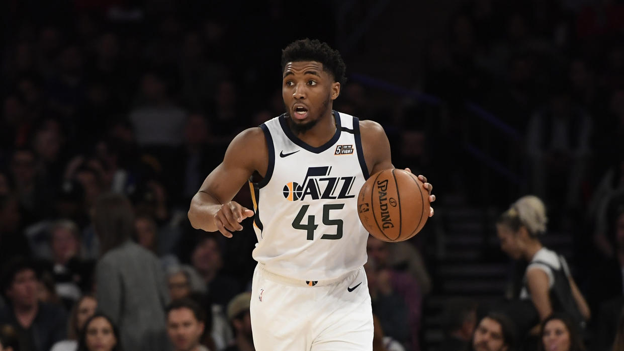 Utah Jazz guard Donovan Mitchell (45) dribbles the ball during the second half of an NBA basketball game against the New York Knicks in New York, Wednesday, March 4, 2020. (AP Photo/Sarah Stier)