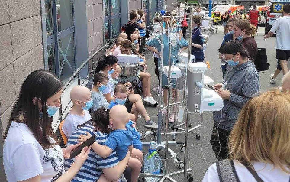 Children hooked up to IV drips and their parents were seen waiting patiently in a queue of seats