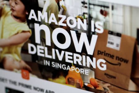 The Amazon Singapore website announcing deliveries in Singapore is seen in this illustration photo July 27, 2017. REUTERS/Thomas White/Illustration