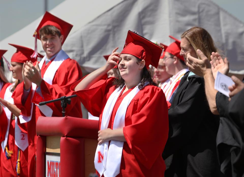 Angelina Colon, the selected senior speaker, receives a round of applause for her rhyming speech during Milton High School's graduation ceremony Sunday, June 5, 2022.