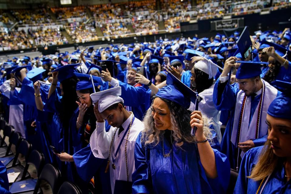 Graduating seniors turn their tassels during the Antioch High School class of 2023 commencement in May.