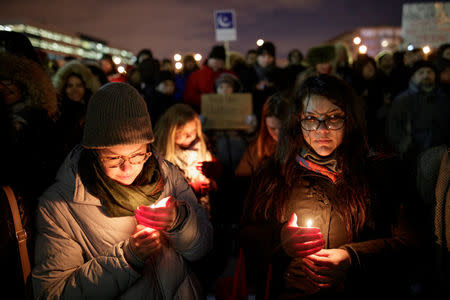 People attend a vigil in support of the Muslim community in Montreal, Quebec, January 30, 2017. REUTERS/Dario Ayala