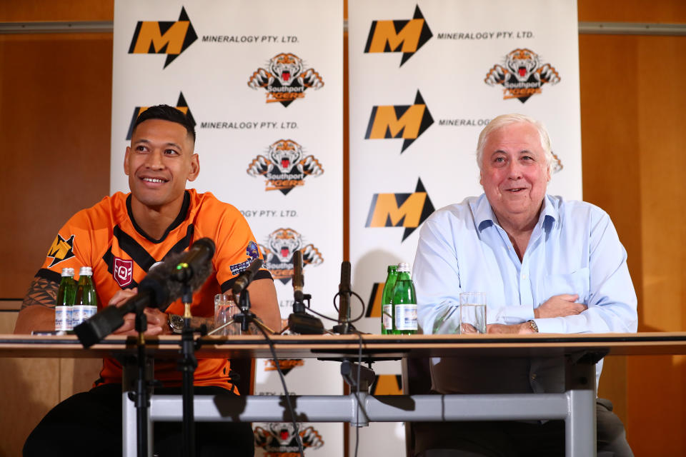 Israel Folau (pictured left) and Clive Palmer (pictured right) speak to the media during a press conference at the Hilton Hotel on May 21, 2021 in Brisbane, Australia.