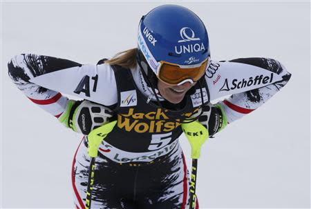 Marlies Schild of Austria reacts in the finish area during the first run of the women's slalom at the FIS Alpine Skiing World Cup Finals in Lenzerheide March 15, 2014. REUTERS/Leonhard Foeger