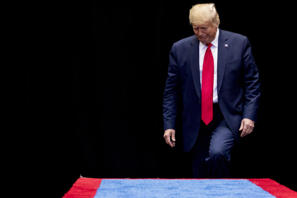 President Donald Trump takes the stage at a campaign rally at American Airlines Arena in Dallas, Texas, Thursday, Oct. 17, 2019. (AP Photo/Andrew Harnik)