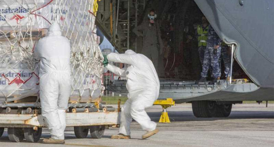 An Australian Defence Force, a C-130J Hercules aircraft is unloaded of humanitarian aid supplies at Fua'amotu International Airport, Tonga.