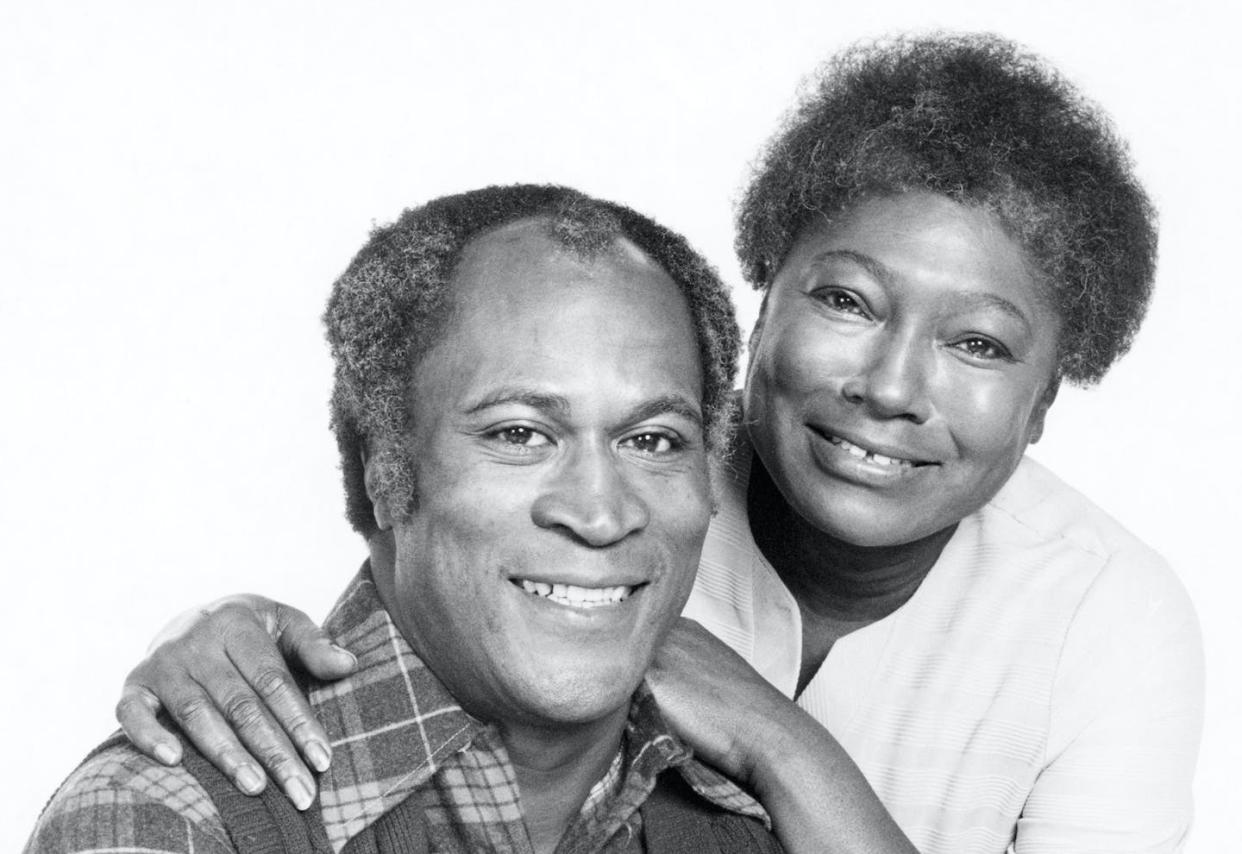 Esther Rolle, right, and John Amos starred in the pathbreaking 1970s Black sitcom. <a href="https://www.gettyimages.com/detail/news-photo/american-actors-john-amos-as-james-evans-sr-and-esther-news-photo/180965295?adppopup=true" rel="nofollow noopener" target="_blank" data-ylk="slk:Moviepix via Getty Images;elm:context_link;itc:0;sec:content-canvas" class="link ">Moviepix via Getty Images</a>