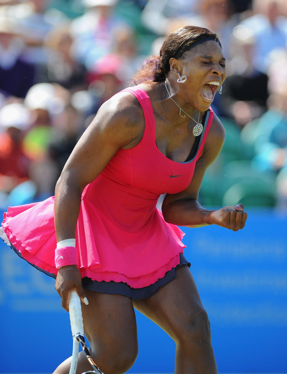 EASTBOURNE, ENGLAND - JUNE 15: Serena Williams of USA in action against Vera Zvonareva of Russia during day five of the AEGON International at Devonshire Park on June 15, 2011 in Eastbourne, England. (Photo by Mike Hewitt/Getty Images)