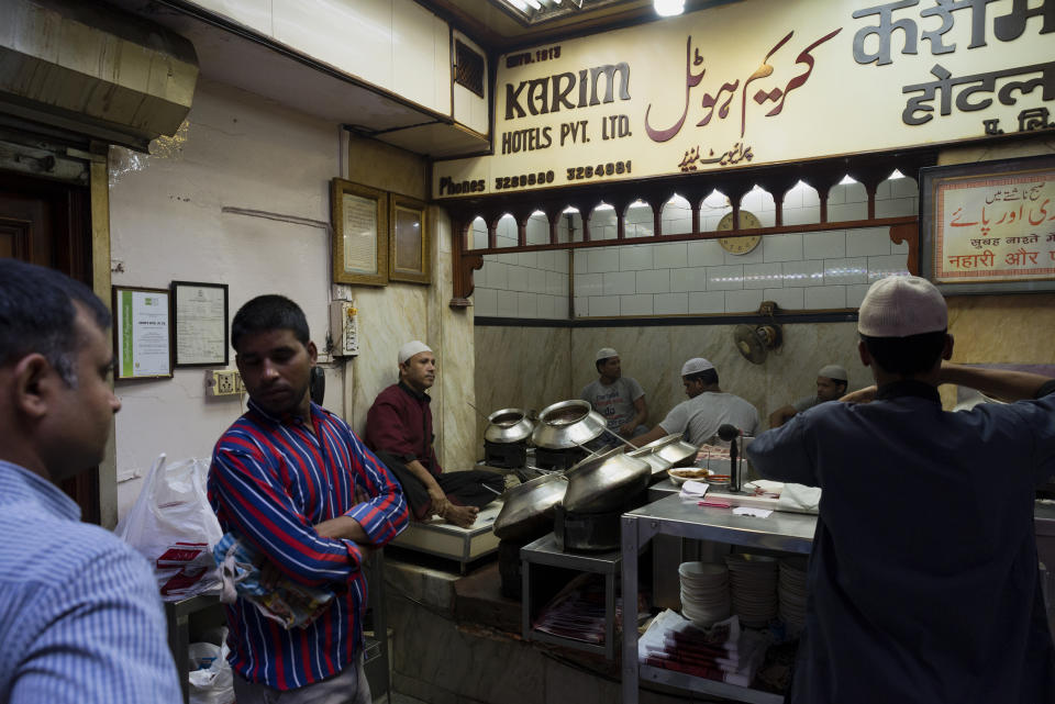 <p>Tucked away in the narrow lanes of Chandni Chowk, Karim’s has been in business since 1913. Amidst the chaos of what could well be the microcosm of India, Karim’s is a haven for the hungry. Head over to Karim’s for its Nihari and Jahangiri and also the opportunity to watch life go by as you dig into your second plate of mutton biryani. (Photo by Subhendu Sarkar/LightRocket via Getty Images)</p> 