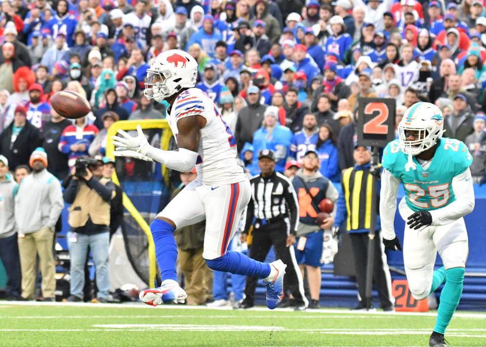 Stefon Diggs catching a TD pass last year against the Dolphins wearing the classic Bills' throwback helmet.