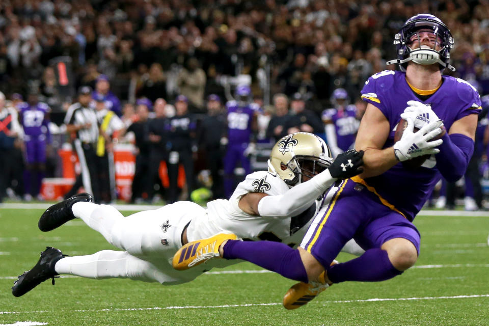 Adam Thielen of the Minnesota Vikings catches a pass over Patrick Robinson of the New Orleans Saints. (Photo by Sean Gardner/Getty Images)